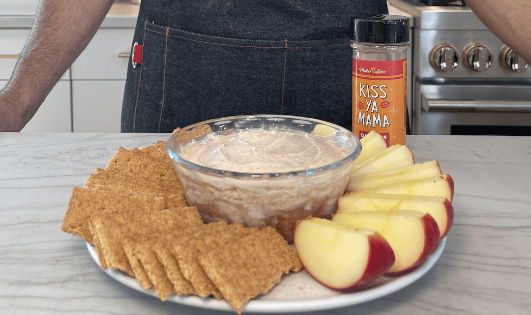 Cinnamon Roll Cream Cheese Dip with a bottle of Kiss Ya Mama Cinnamon Sugar