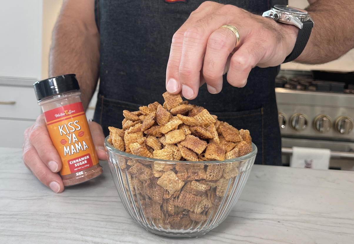 Cinnamon Sugar Chex Mix with bottle of Kiss Ya Mama Cinnamon Sugar